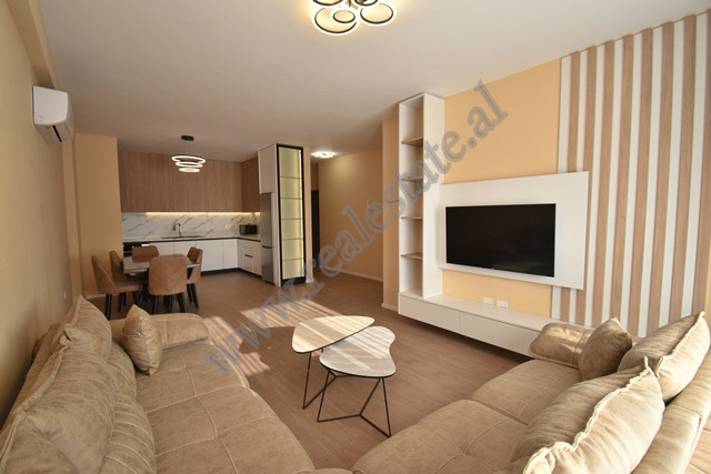 Two bedroom apartment with a veranda for rent in Hiqmet Buzi Street, very close to the Artificial La